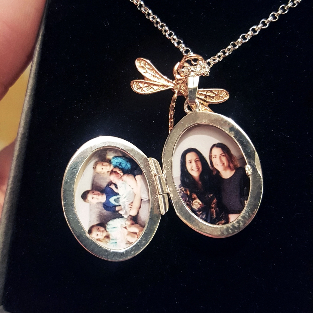 oval locket with dragonfly with two photos