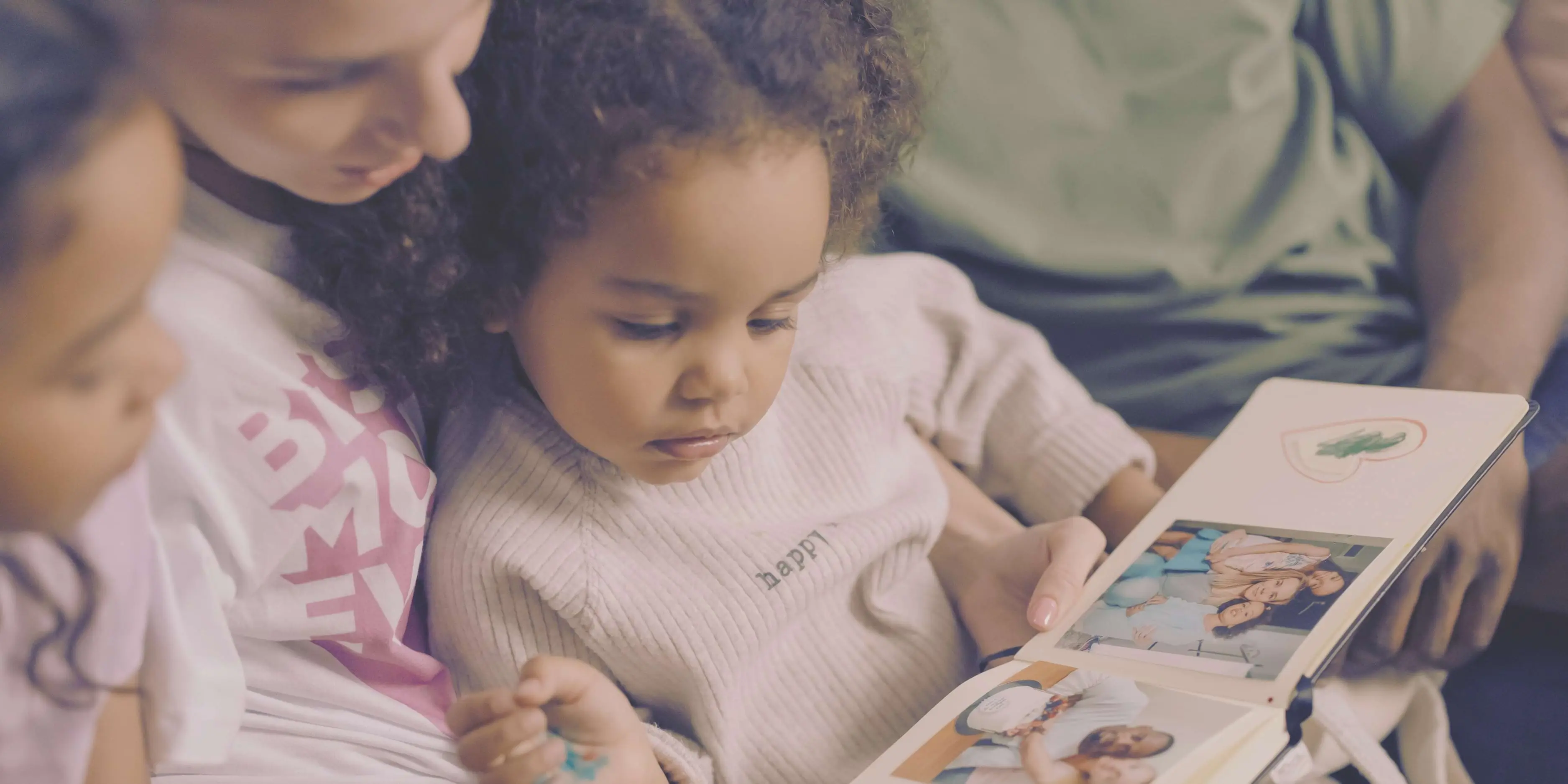Mother and child browsing a photo album